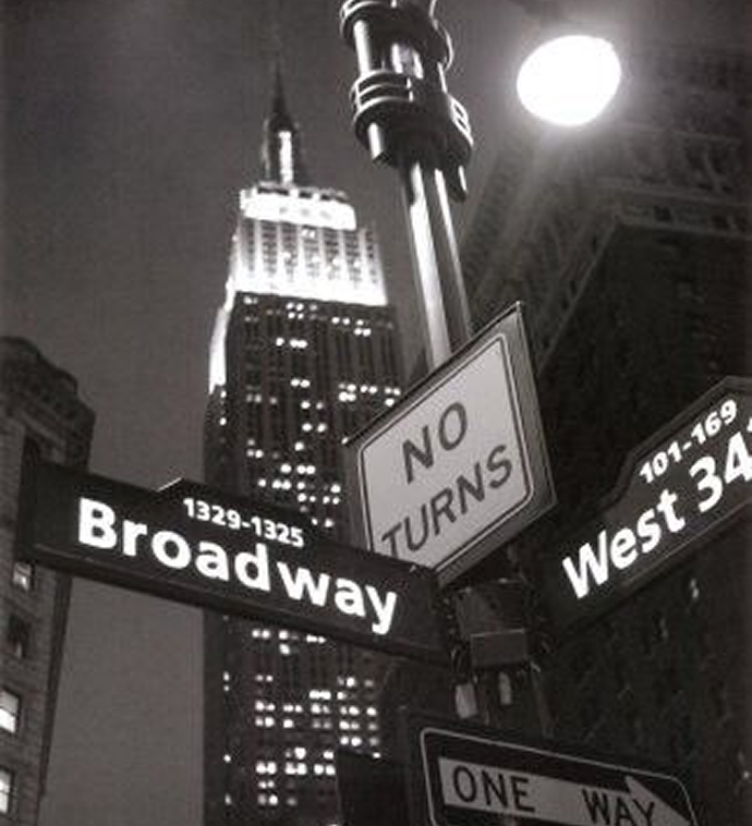Broadway street signs at night