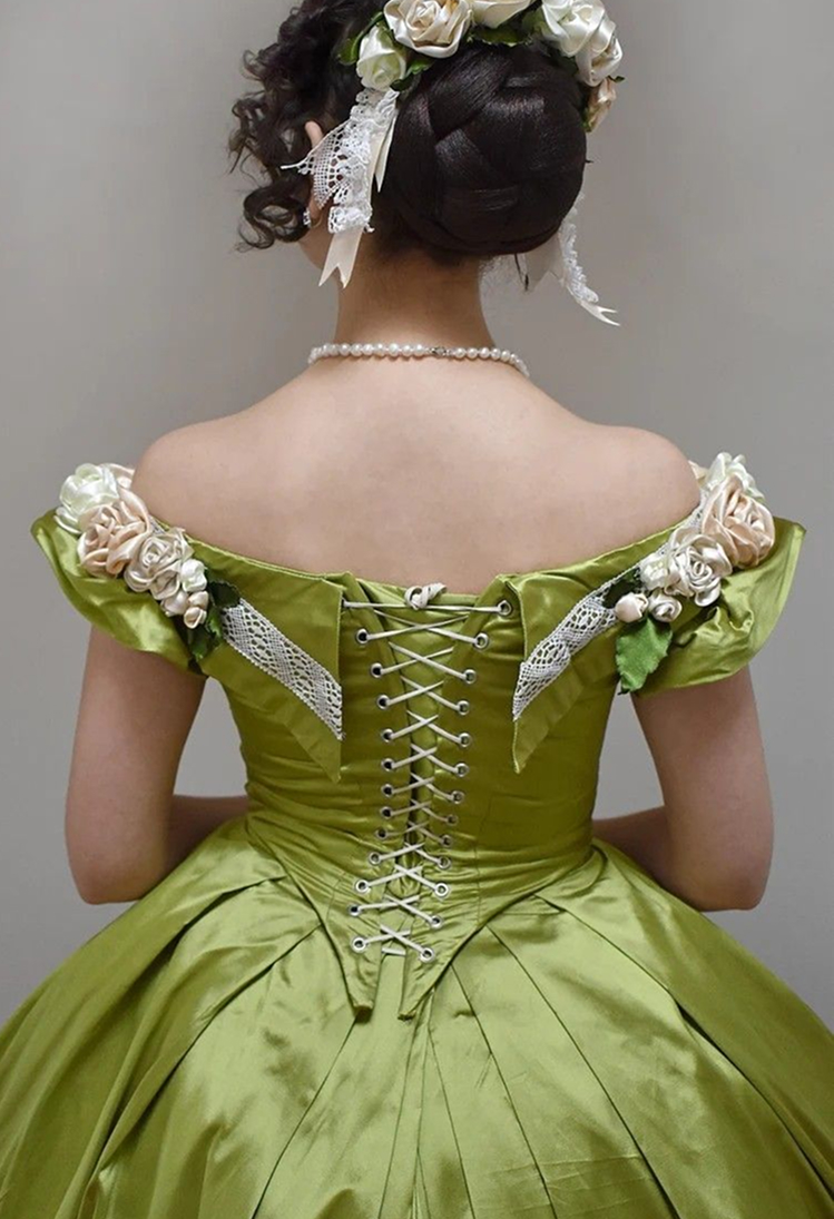 Period gown with ribbon-laced corset