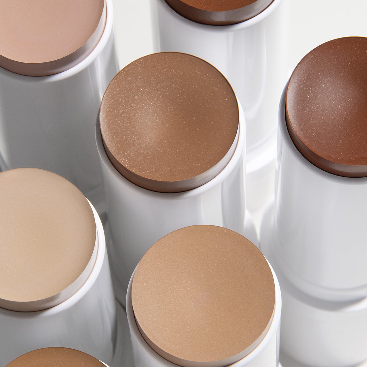 Tinted Luminizer stick tops, shade range